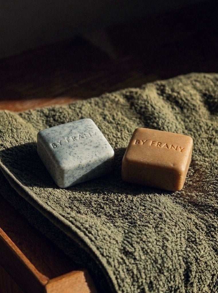 By Frany bar soaps on a textured towel